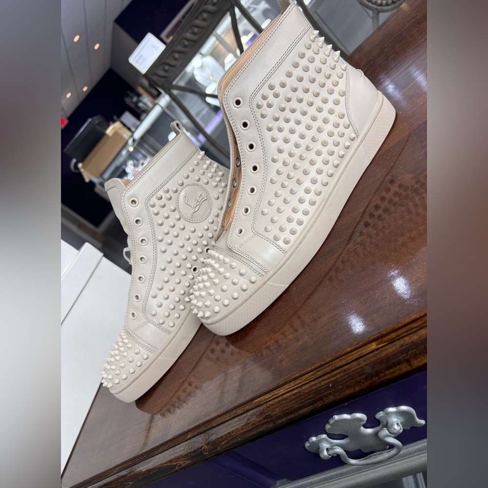 CHRISTIAN LOUBOUTIN “Louis Spike” high tops in off-white